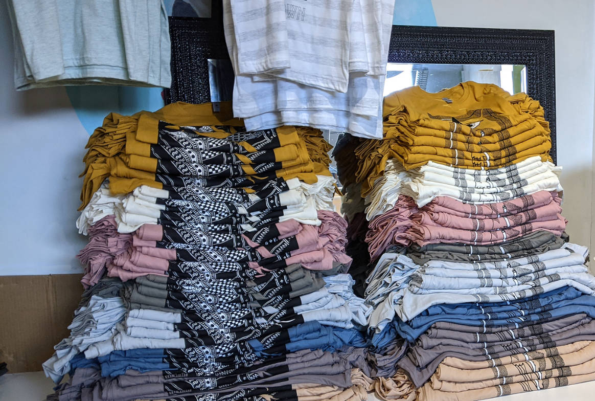 Stacks of shirts — high-quantity production